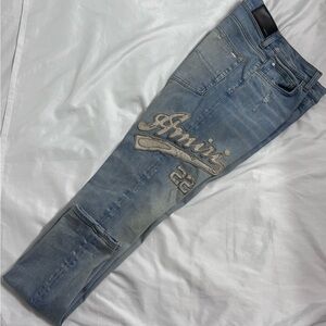 AMIRI Light Blue Skinny Jeans with Distressed Details